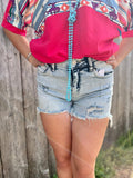 Distressed washed denim shorts