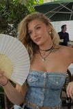 Denim distressed tube top