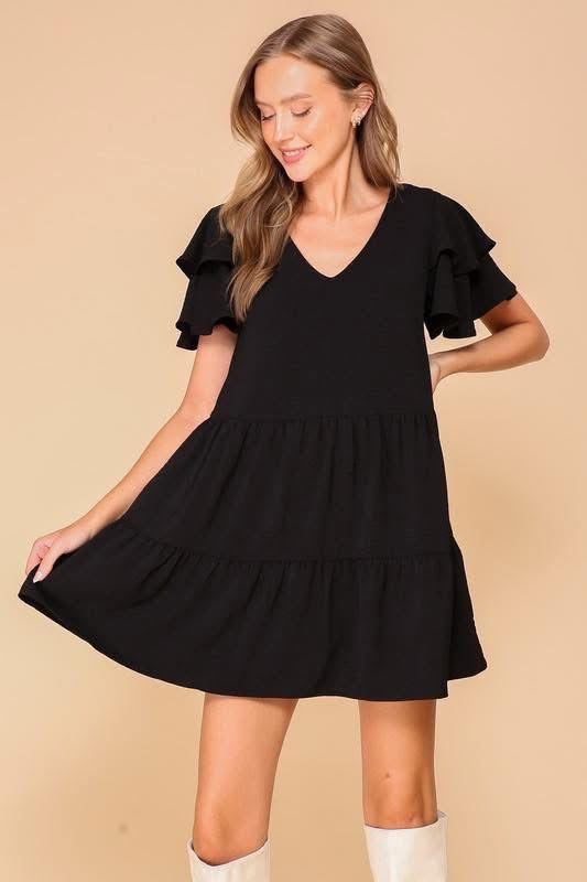 Black ruffle dress