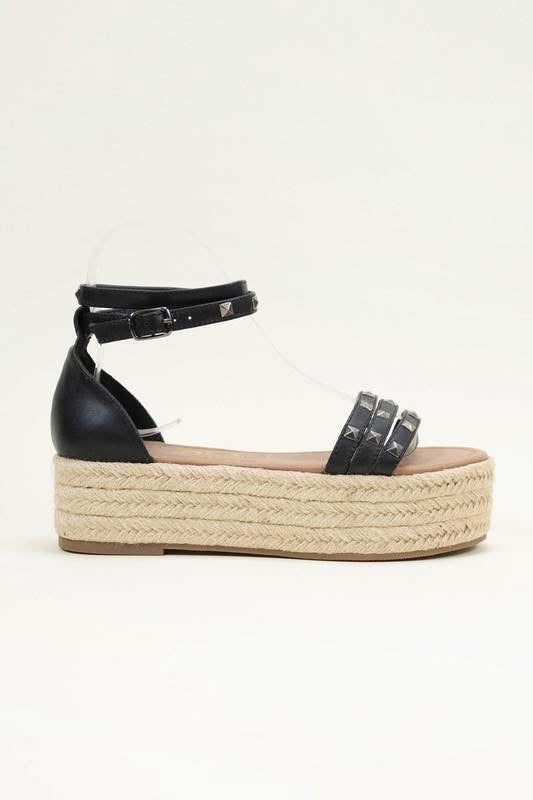 Black studded platforms