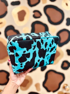 Turquoise cow print makeup bag/travel bag